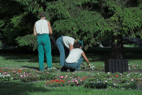 Gardener preparing PPE and checking tools before work